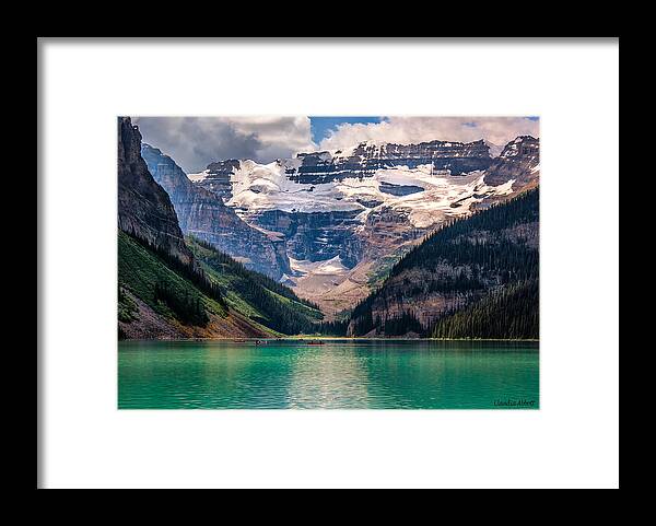 Canada Framed Print featuring the photograph Canoes on Lake Louise by Claudia Abbott