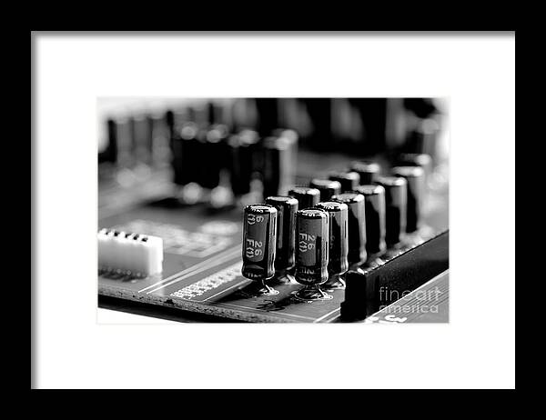 Capacitors Framed Print featuring the photograph Capacitors All In A Row by Mike Eingle