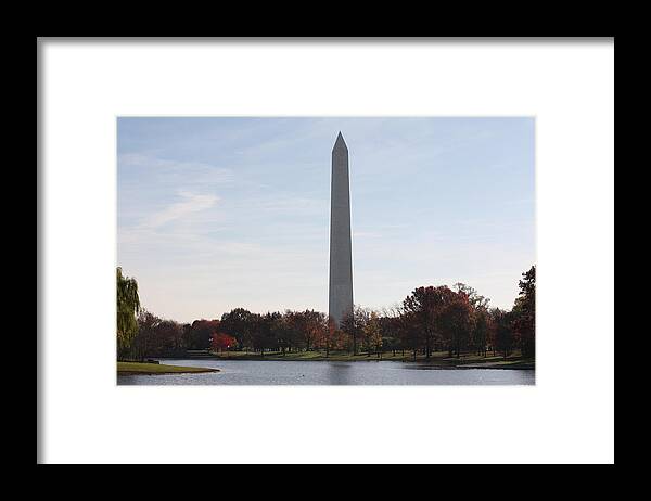 Capital Framed Print featuring the photograph Capital Autumns - The Washington Monument in the Fall by Ronald Reid