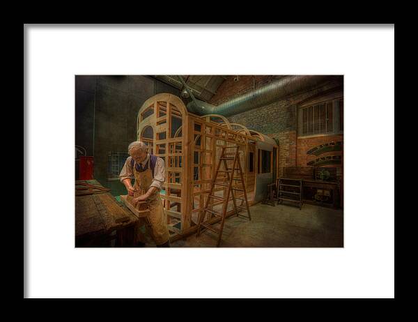 Clare Bambers Framed Print featuring the photograph Carpenter working on Carriage by Clare Bambers