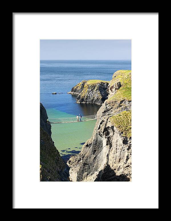Carrick A Rede Framed Print featuring the photograph Carrick-a-rede rope bridge Northern Ireland by Pierre Leclerc Photography