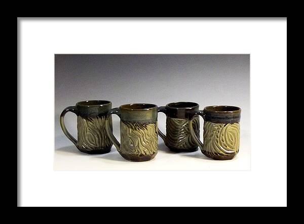 Cups Framed Print featuring the ceramic art Carved Mugs by Stephen Hawks