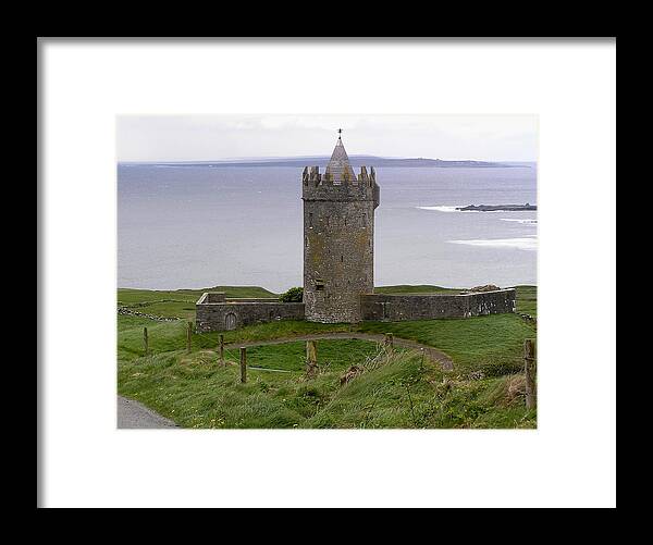 Castle Framed Print featuring the photograph Castle by the Sea in Ireland by Jeanette Oberholtzer