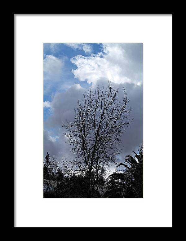 Landscape Framed Print featuring the photograph Caught Between the Storms by Michele Myers