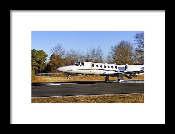 Cessna Framed Print featuring the photograph Cessna Citation Touchdown by Jason Politte