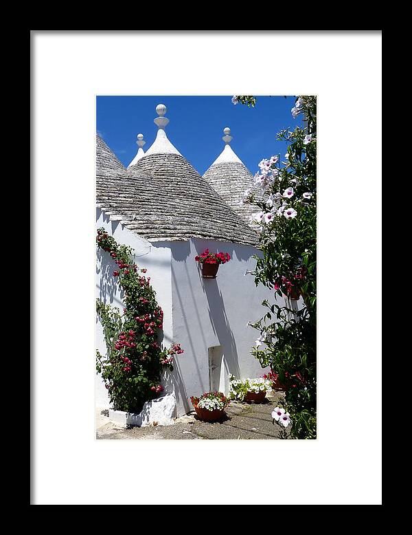 Alberobello Framed Print featuring the photograph Charming Trulli by Carla Parris
