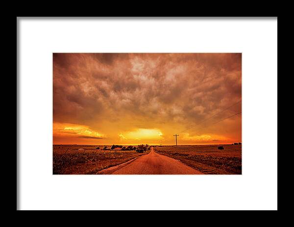 Landscape Framed Print featuring the photograph Chasing the Sunset by Toni Hopper