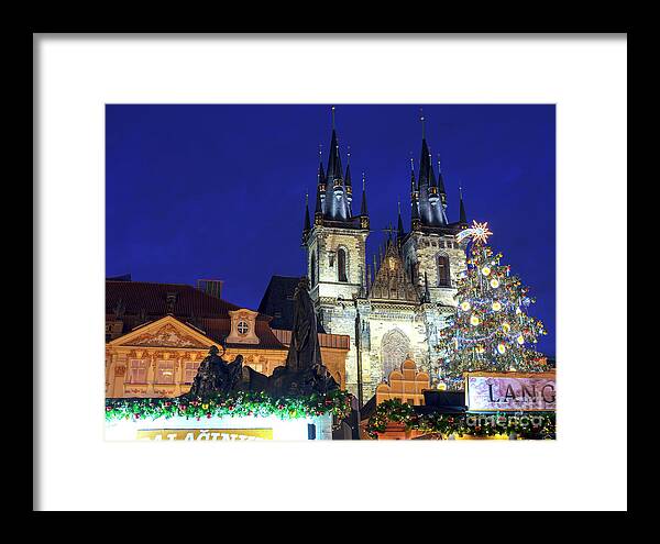 Christmas Star In Old Town Square Framed Print featuring the photograph Christmas Star in Old Town Square Prague by John Rizzuto