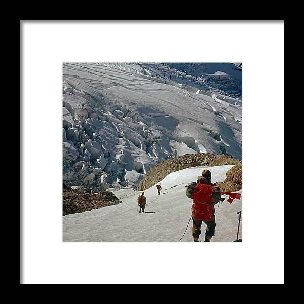 Climbing Party Framed Print featuring the photograph T-204805-Climbing Party Mt. Rainier by Ed Cooper Photography