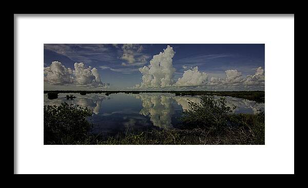 Clouds Framed Print featuring the photograph Clouds and Reflections by Dorothy Cunningham