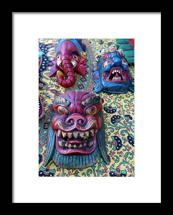 Nepal.nepalese Framed Print featuring the photograph Colorful Nepalese Masks by John Mitchell