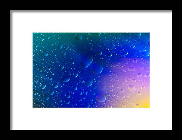 Abstract Framed Print featuring the photograph Colorfull Water drop background abstract by Michalakis Ppalis