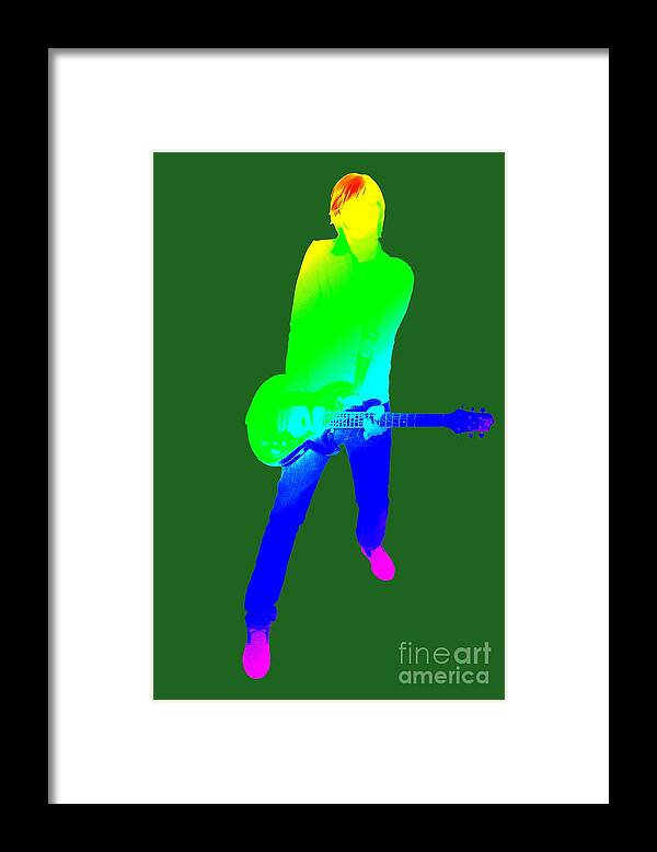 Green Framed Print featuring the digital art colourful guitar player. Music is my passion by Ilan Rosen