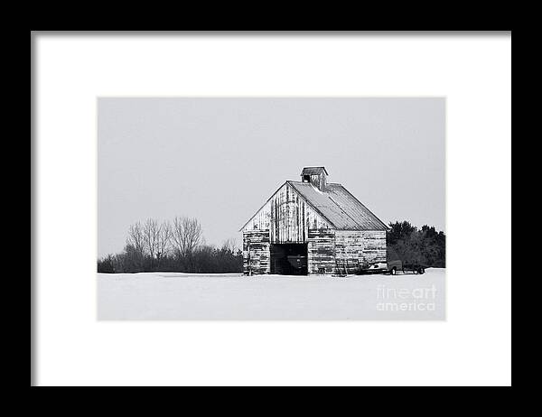 Corn Crib Farm Iowa Agriculture Winter Snow Black White Monochrome Framed Print featuring the photograph Corn Crib in the Winter by Ken DePue