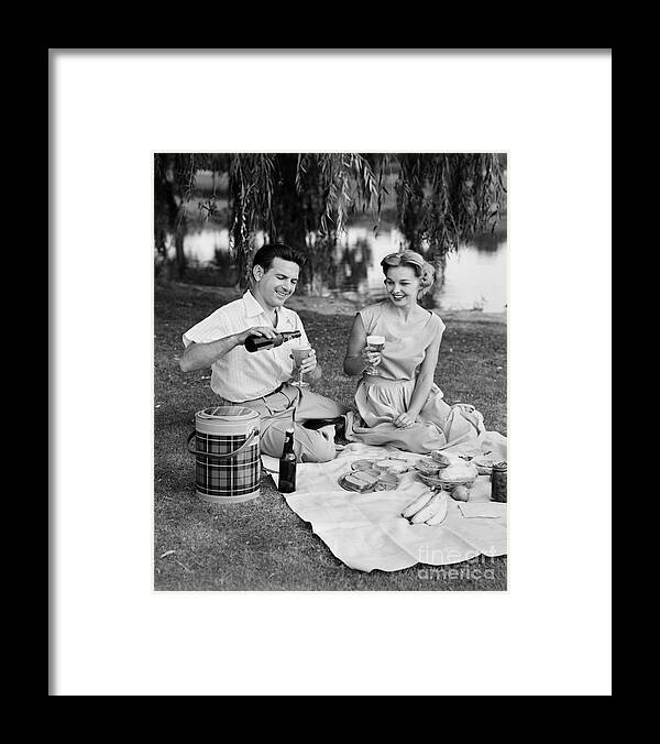 1950s Framed Print featuring the photograph Couple Having A Summer Picnic, C.1950s by H. Armstrong Roberts/ClassicStock