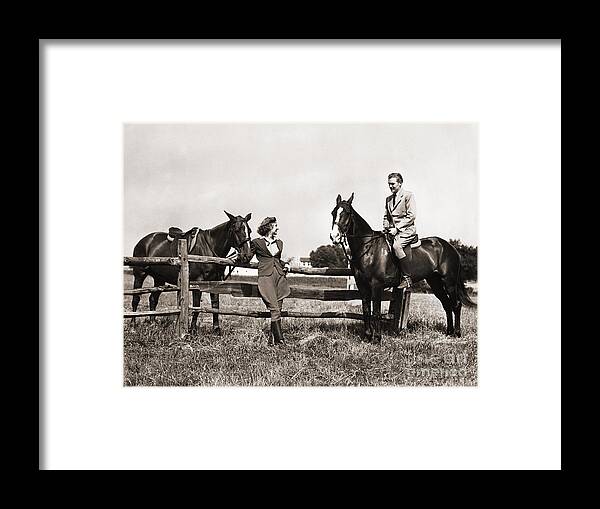 1930s Framed Print featuring the photograph Couple Out Riding, C.1930-40s by H Armstrong Roberts and ClassicStock