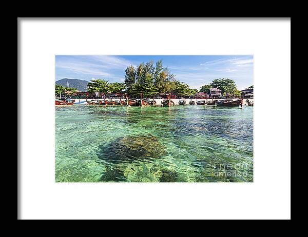 Koh Lipe Framed Print featuring the photograph Crystal clear and turquoise water in the Andaman sea by Didier Marti