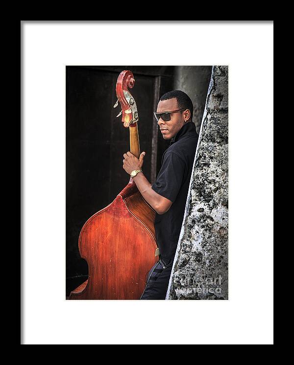 Cuba Framed Print featuring the photograph Cuban Bass Player by Craig J Satterlee
