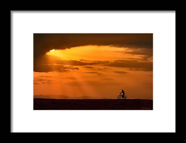 Sun Framed Print featuring the photograph Cycling Into Sunrays by Joe Bonita