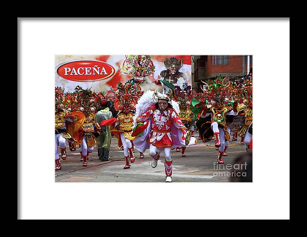 Bolivia Framed Print featuring the photograph Diablada Dancers at Oruro Carnival Bolivia by James Brunker