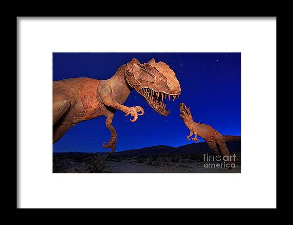 Dinosaurs Framed Print featuring the photograph Dinosaur battle in Jurassic Park by Sam Antonio