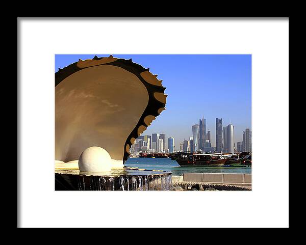 Fountain Framed Print featuring the photograph Doha fountain skyline and harbour by Paul Cowan