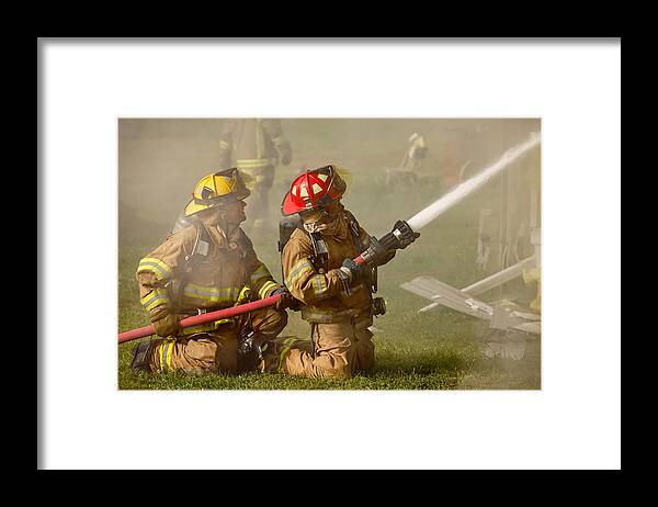 Fire Framed Print featuring the photograph Dousing the Flames by Todd Klassy