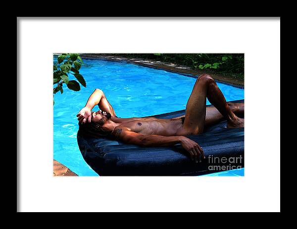 Athlete Framed Print featuring the photograph Dozing by the Pool by Robert D McBain
