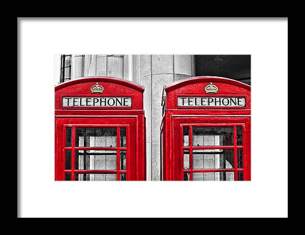 Sharon Popek Framed Print featuring the photograph Dueling Telephones by Sharon Popek