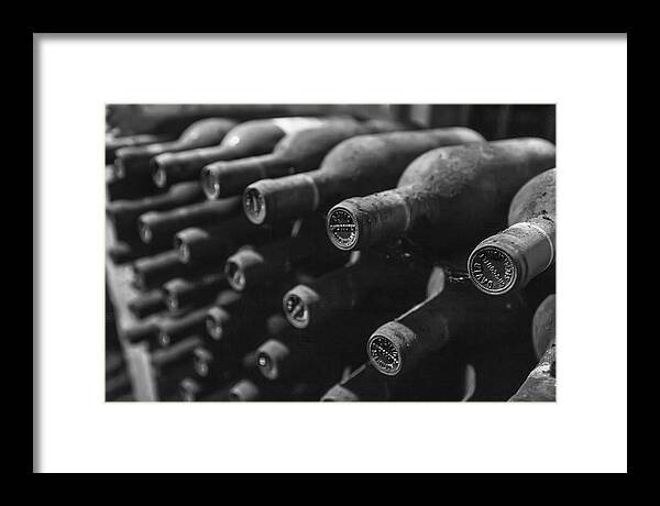 Dusty Wine Bottles Framed Print featuring the photograph Dusty Wine Bottles by Georgia Clare