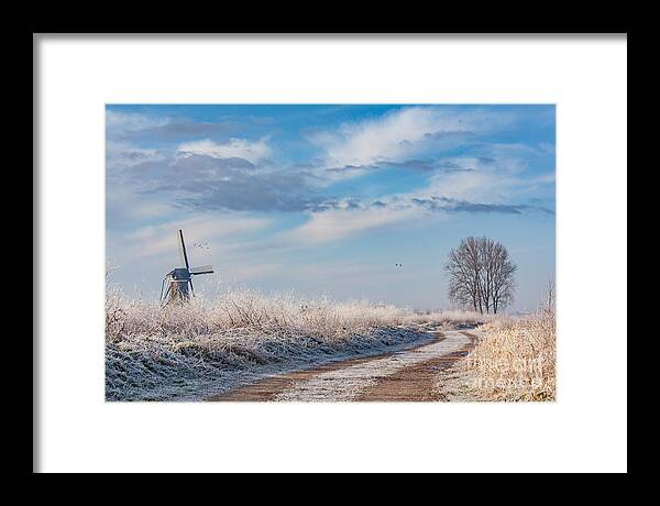 Holland Framed Print featuring the photograph Dutch windmill in winter by Casper Cammeraat