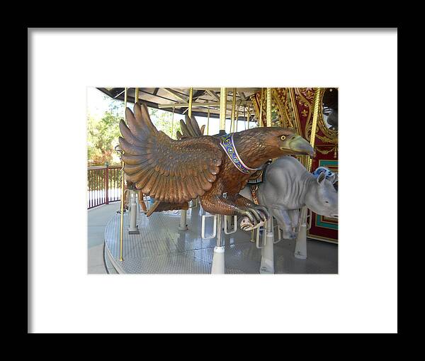 Eagle With Fish Framed Print featuring the photograph Eagle With Fish on Carousel by Colleen Cornelius