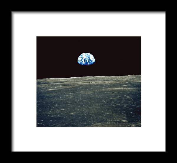 Earthrise Framed Print featuring the photograph Earthrise Photographed From Apollo 11 Spacecraft by Nasa