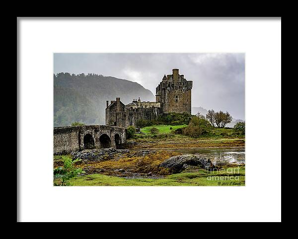 Eilean Donan Castle Framed Print featuring the photograph Eilean Donan Castle by Sue Karski