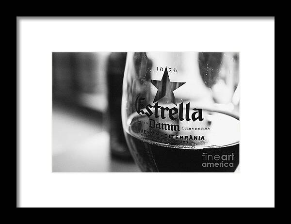 Estrella Framed Print featuring the photograph Estrella Damm by Iryna Liveoak