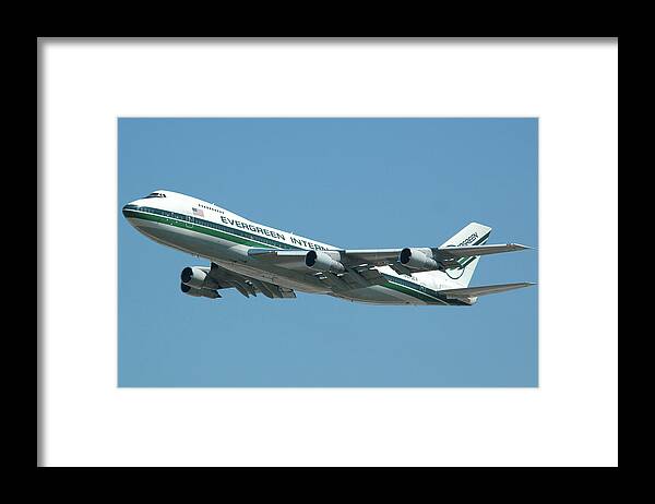 Airplane Framed Print featuring the photograph Evergreen International 747-273C N470EV at San Bernardino May 31 2006 by Brian Lockett