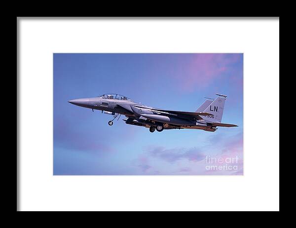 Usaf Framed Print featuring the photograph F15 coming into land lowering landing gear by Simon Bratt