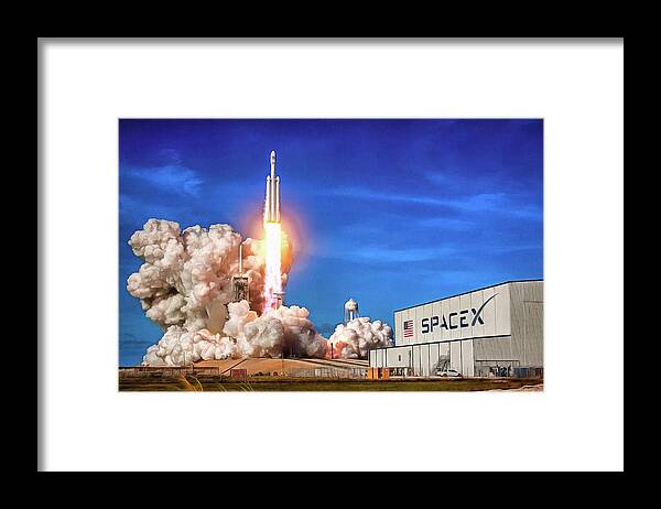 Falcon Heavy Framed Print featuring the photograph Falcon Heavy SpaceX rocket launch maiden flight by SpaceX