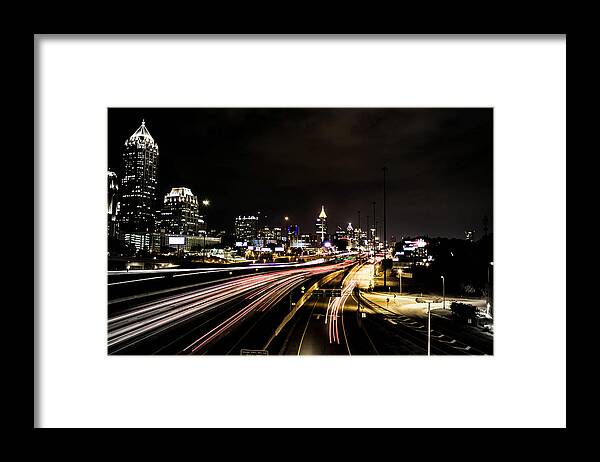 Traffic Framed Print featuring the photograph Fast Lane by Mike Dunn