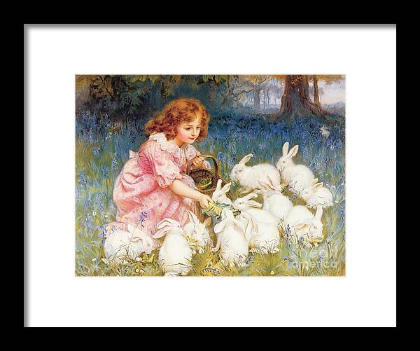 Feeding Framed Print featuring the painting Feeding the Rabbits by Frederick Morgan