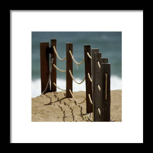 Fence Framed Print featuring the photograph Fence Along the Beach by Julie Niemela