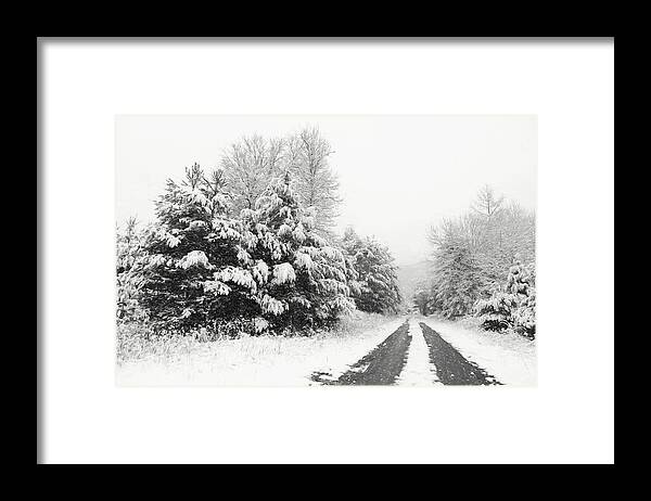 Snow Framed Print featuring the photograph Find a Pretty Road by Lori Deiter