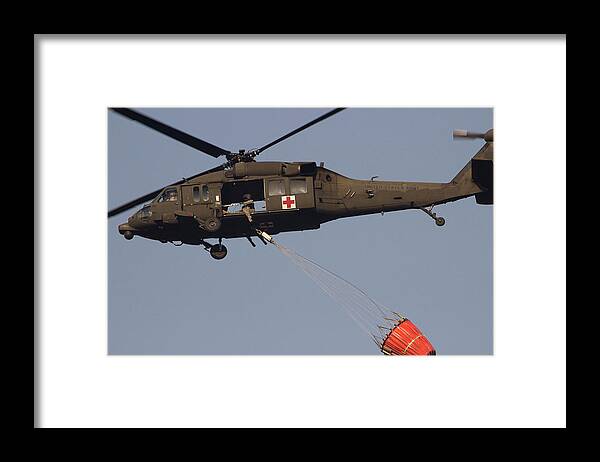 Helicopter Framed Print featuring the photograph Fire Fighting by Mike Eingle