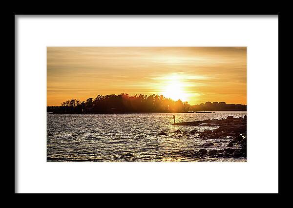 Candid Framed Print featuring the photograph Fishing at sunset - Helsinki, Finland - Color street photography by Giuseppe Milo