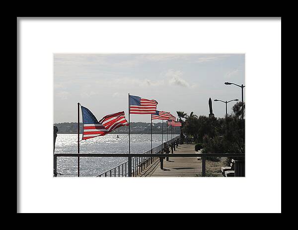 Red Framed Print featuring the photograph Flags On The Inlet Boardwalk by Robert Banach