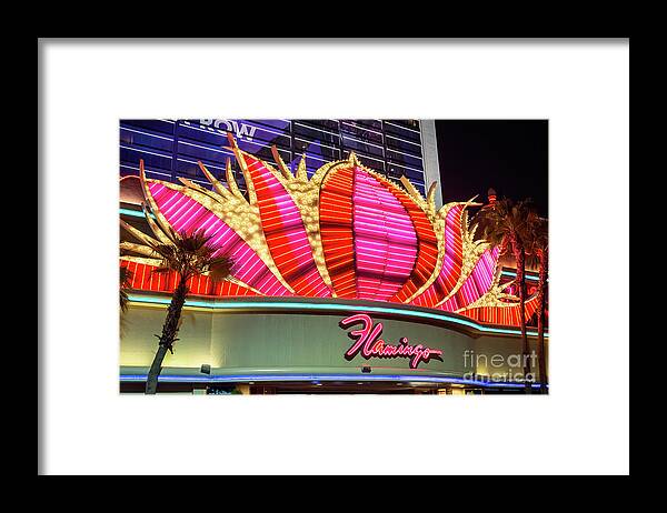 The Flamingo Neon Sign Framed Print featuring the photograph Flamingo Center Neon Sign at Night by Aloha Art