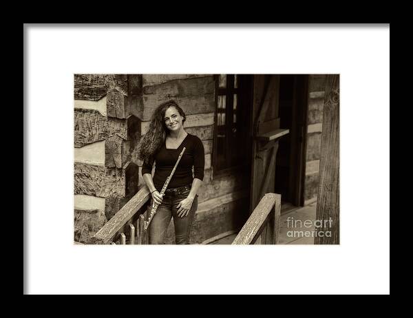 Nina Assimakopoulos Framed Print featuring the photograph Flute player at the log home by Dan Friend