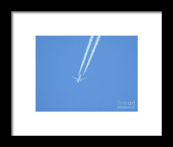 Airplane Framed Print featuring the photograph Fly Over The Ocean by Jan Gelders