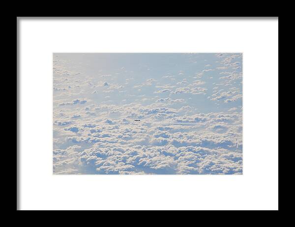 Flying Framed Print featuring the photograph Flying among the Clouds by Bill Cannon