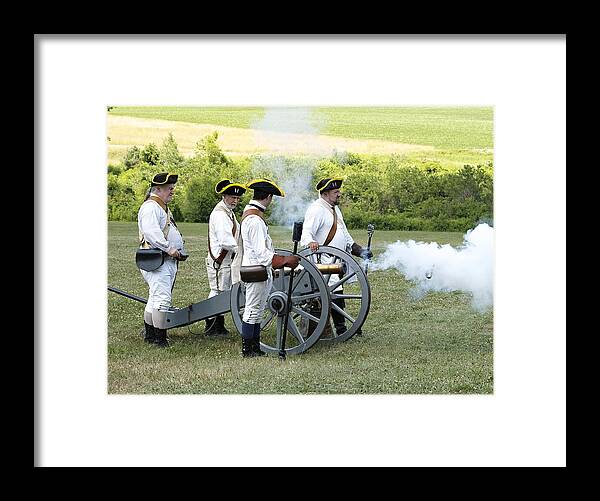 Cannon Revolution Stop Motion Framed Print featuring the photograph Frozen in Time by Harold Piskiel